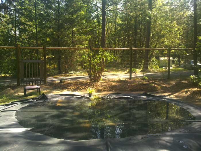 Pond filled - before soil is spread on liner